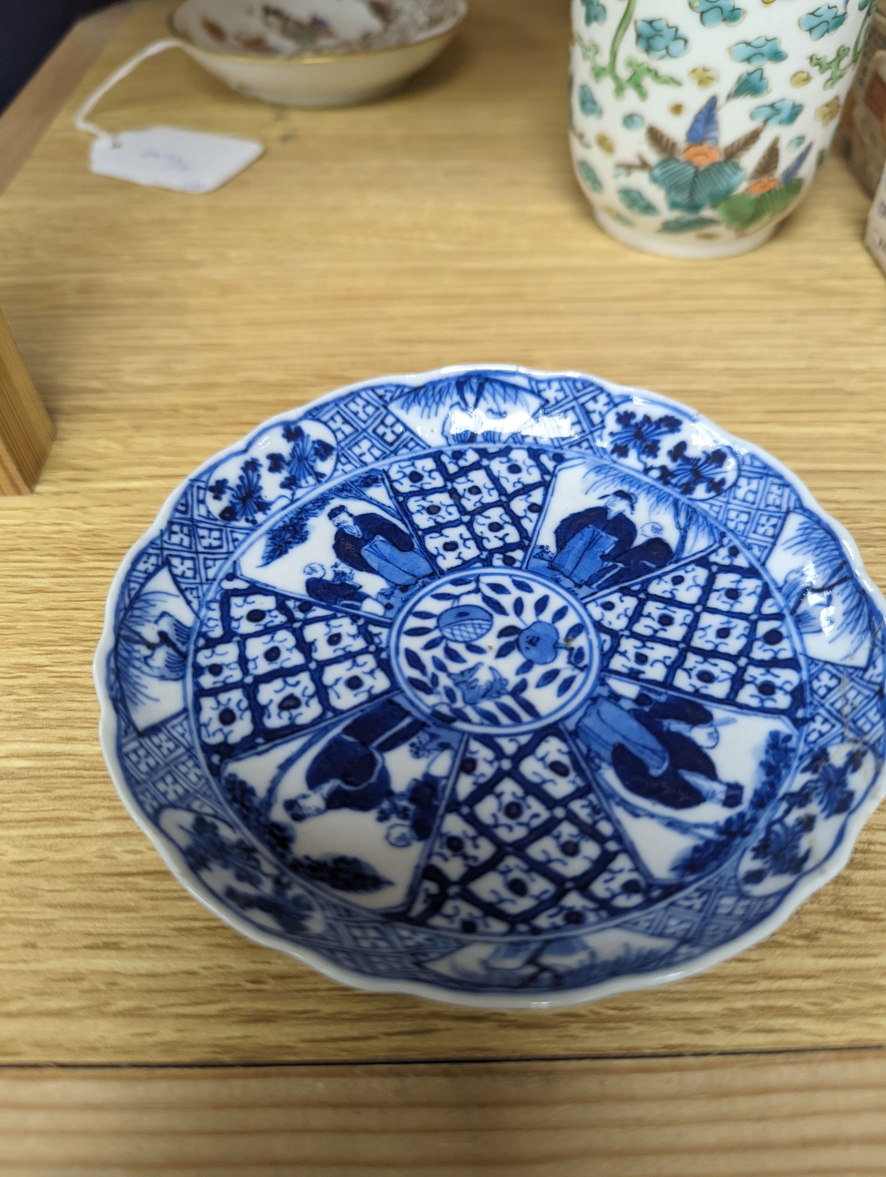 Two Chinese porcelain saucer dishes and an enamelled porcelain vase, 18th century and later, 12.5cm